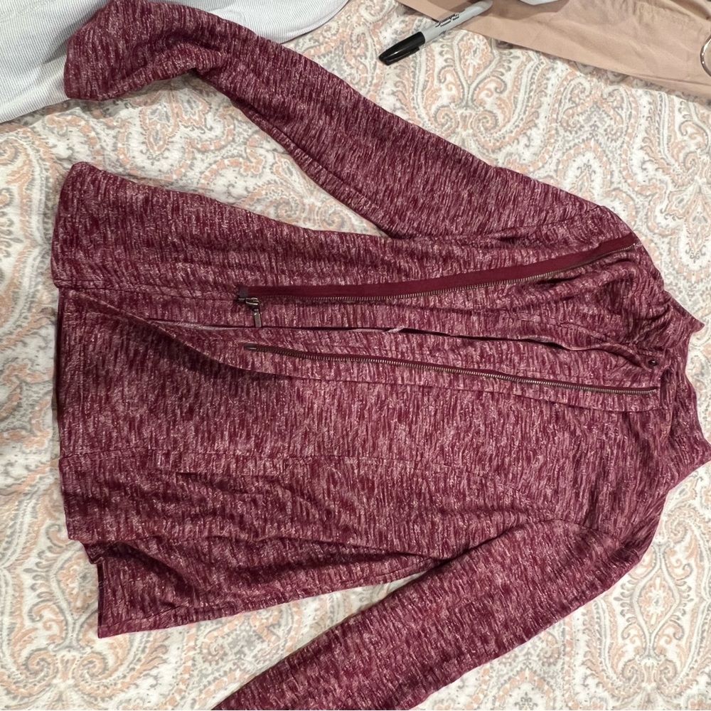 Jacket with a side zipper